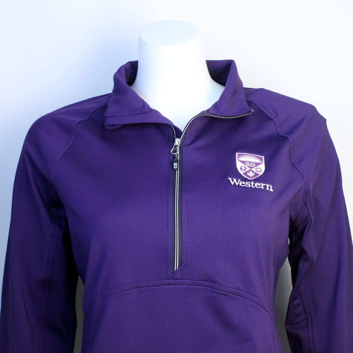 Purple quarter zip long sleeve with the Western Crest logo and script on the left chest.