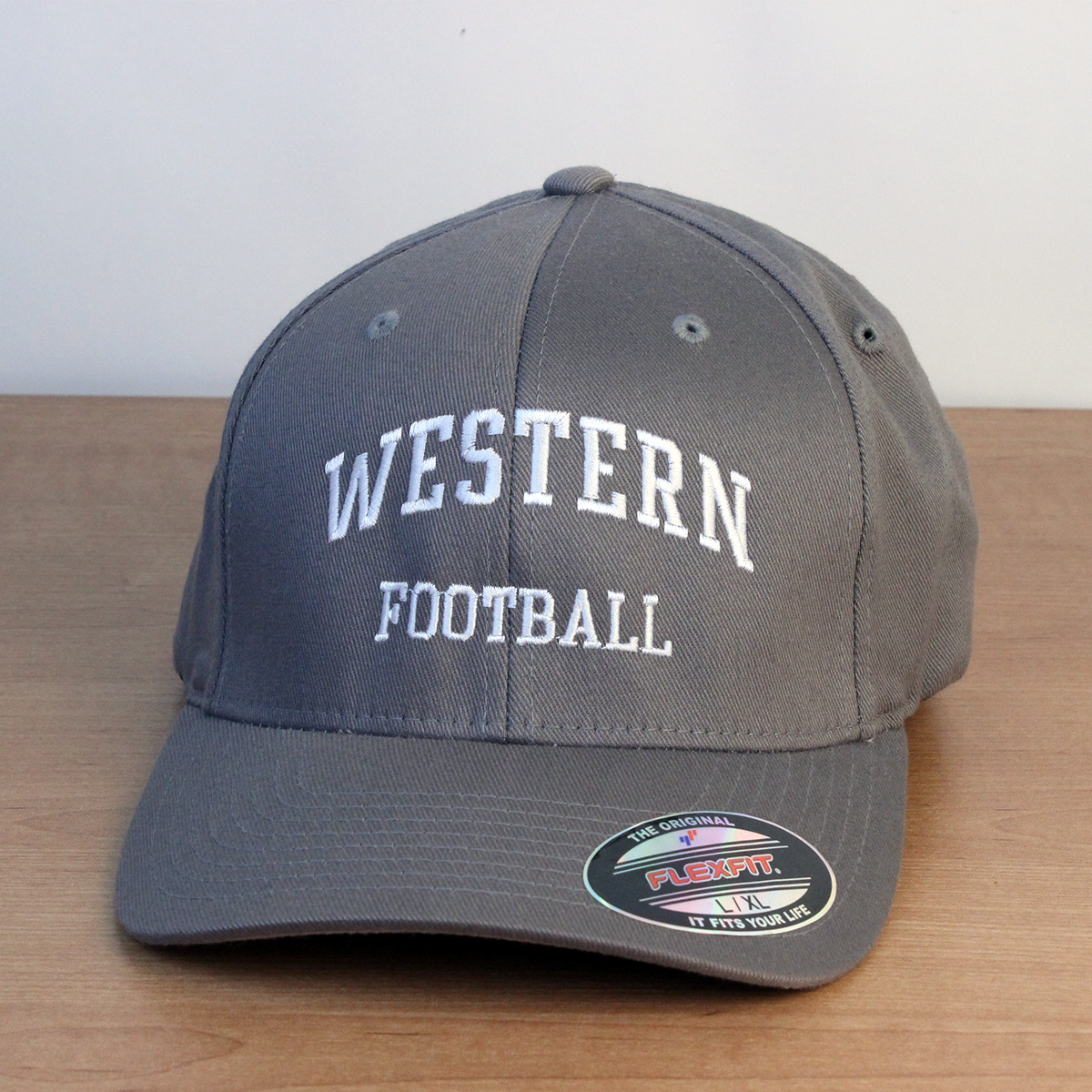 Grey ball cap with Western Football embroidered on the front in white lettering.
