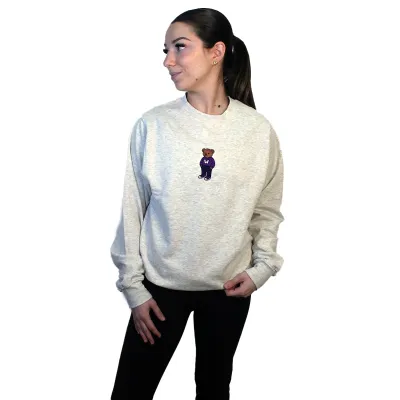 Light grey crewneck with embroidered brown teddy bear wearing a western sweater in the top middle of garment.