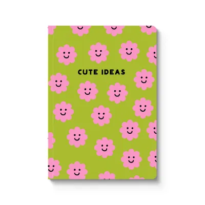 green notebook with pink floral smiley faces
