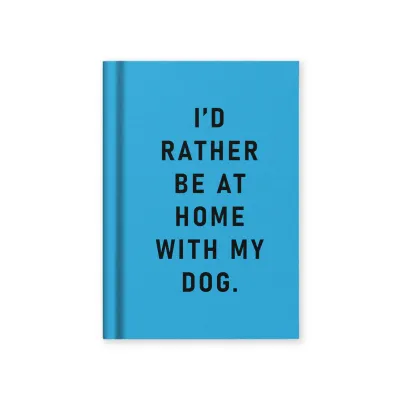 Blue notebook with black text 'I'd rather be at home with my dog'