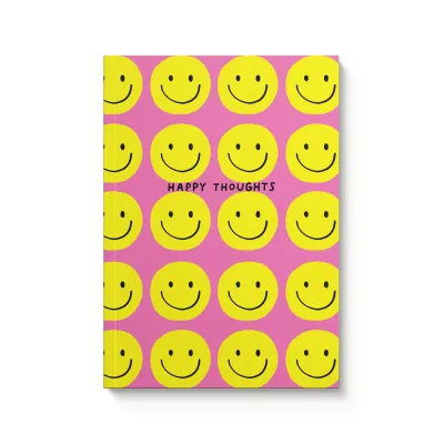 pink notebook with yellow smiley faces