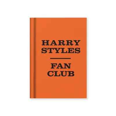 Orange notebook with black text 'Harry Styles Fan Club"
