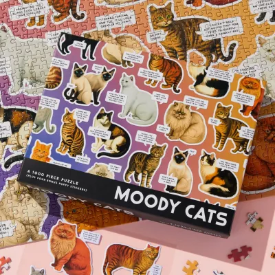 Puzzle of Moody Cats with the box displayed on top