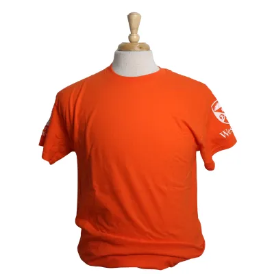 Orange tee with screen printed Crest on the left sleeve and Indigenous art on the back. Created in collaboration with Indigenous Initiatives. 