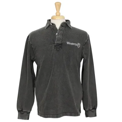 Dark grey dyed rugby shirt with Western and the Crest embroidered on the left chest.