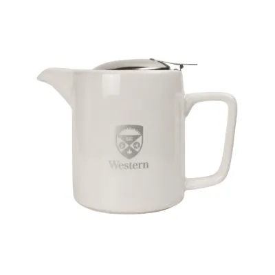 Ceramic teapot with strainer. Engraved Western Crest logo on the front. 16oz capacity. Comes packaged in a box.