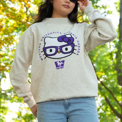Girl wearing hello kitty sweatshirt