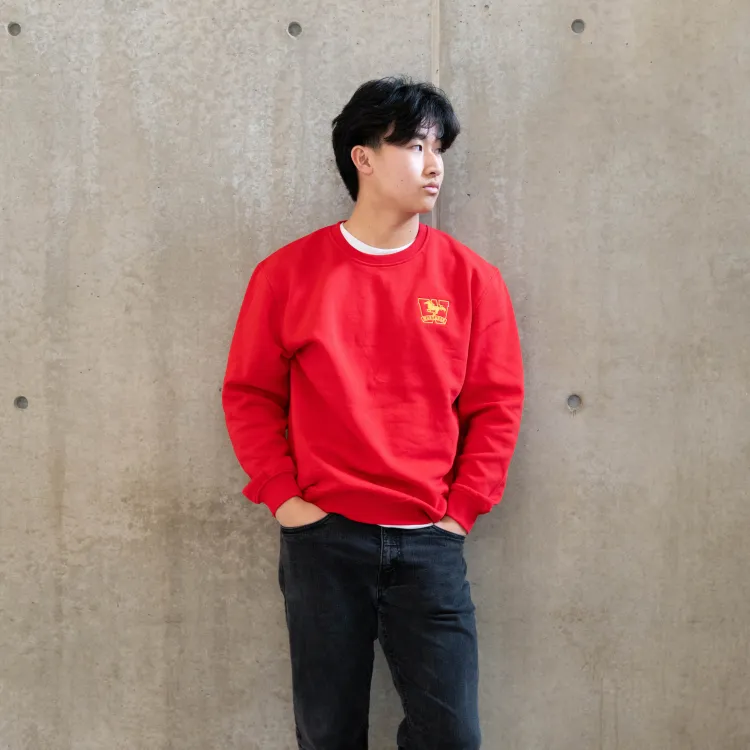 Student wearing Lunar New Year crewneck