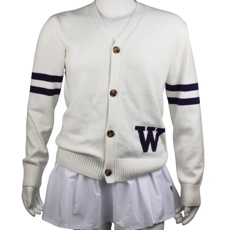 White cardigan with purple striped on the arms and the W on the left side.