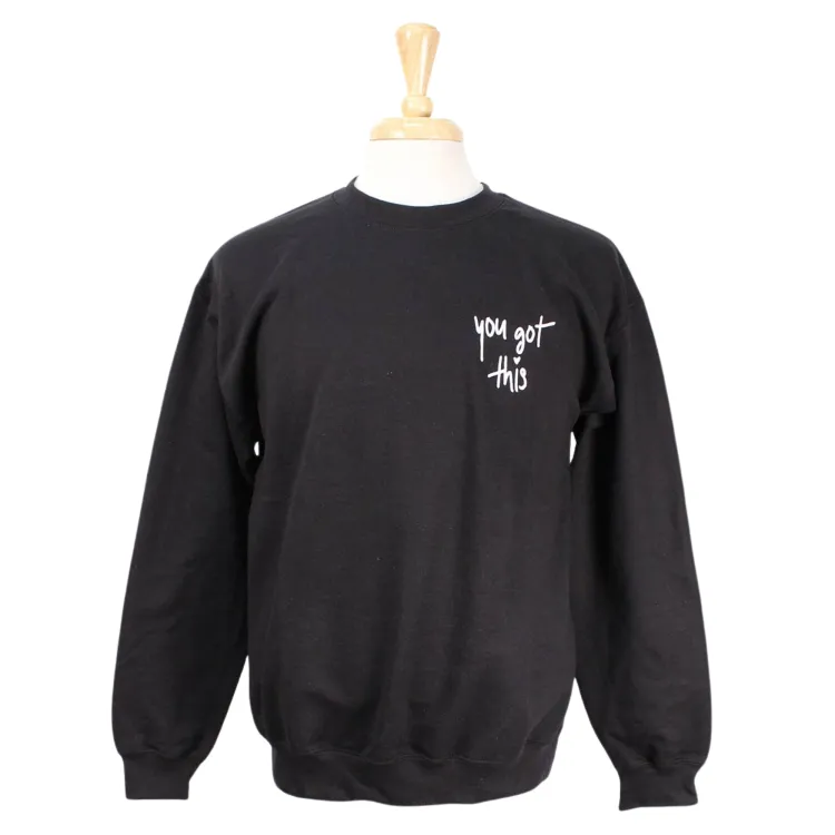 Black crew neck with You Got This embroidered on the left chest.